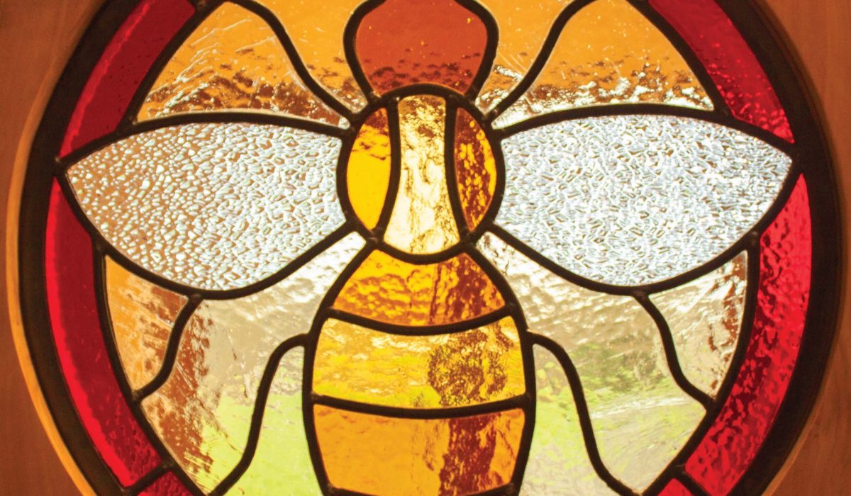 Close-up of a stained glass bee